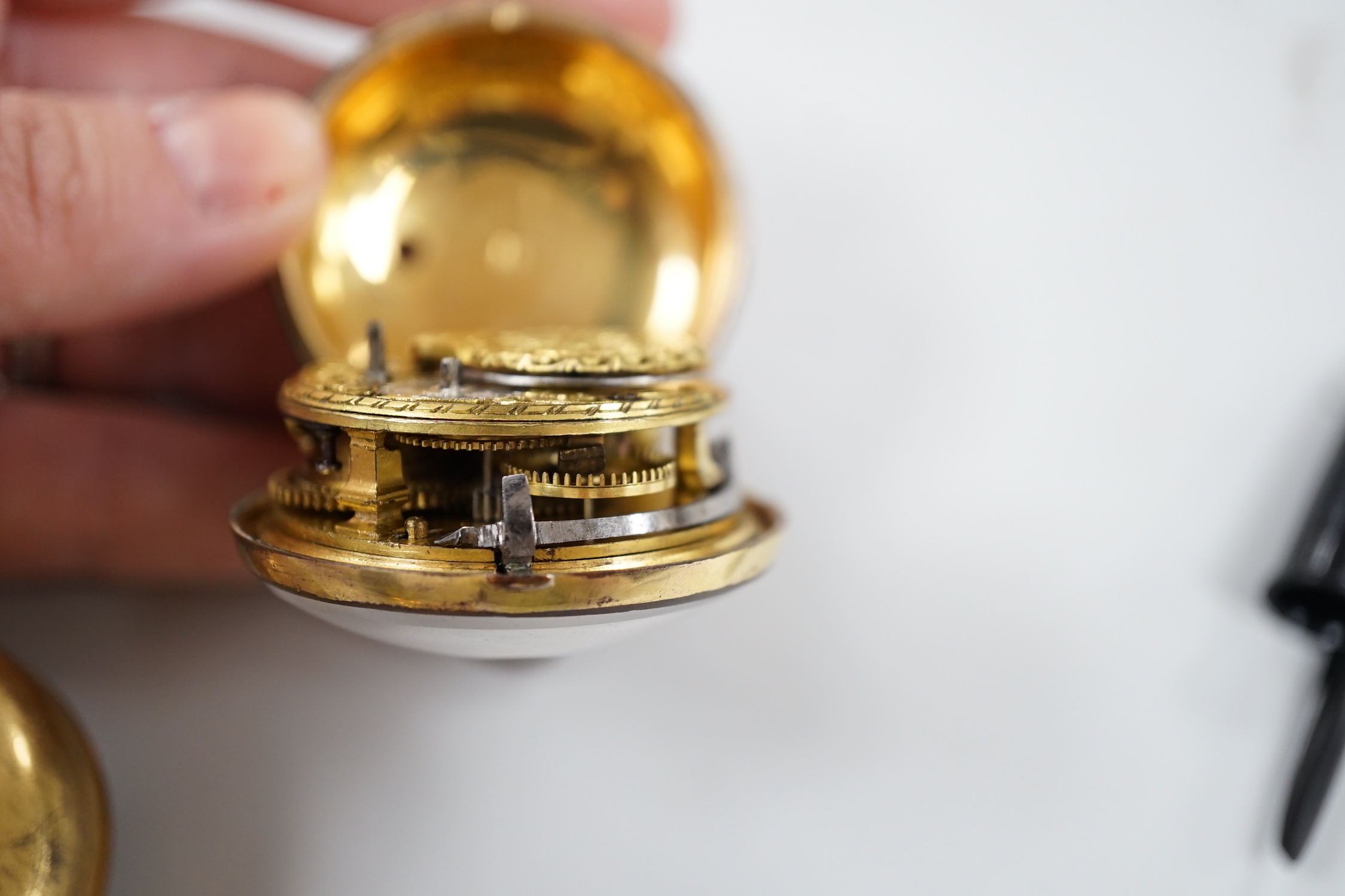 An 18th century gilt metal pair cased keywind verge pocket watch, by Frank Upjohn of London (a.f.) and a similar pocket watch by J. Edmond of Liverpool.